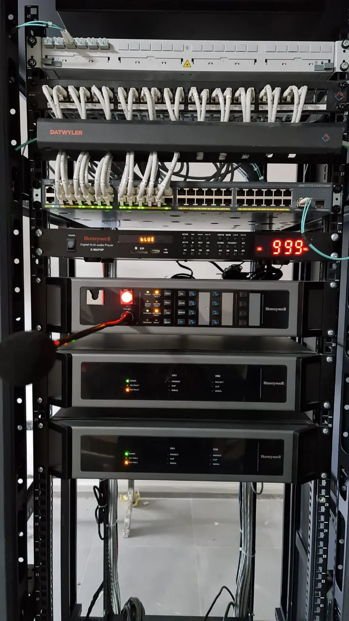 Honeywell audio amplifier public address system rack build zone controlled speaker distribution balanced audio cabling emergency broadcast integration Surrey BC